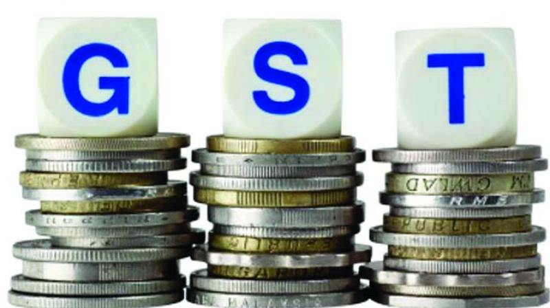 Online retailers Flipkart, Snapdeal and Amazon on Thursday came together to raise concerns about the tax collection at source (TCS) clause under draft model GST law, saying it could result in a capital lock-down for sellers and discourage them from selling online. Online retailers Flipkart, Snapdeal and Amazon on Thursday came together to raise concerns about the tax collection at source (TCS) clause under draft model GST law, saying it could result in a capital lock-down for sellers and discourage them from selling online.