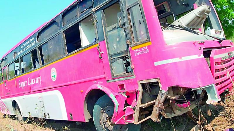 The driver and conductor died in the accident and the police shifted the injured to Nandigama government hospital for treatment. The driver and conductor died in the accident and the police shifted the injured to Nandigama government hospital for treatment.