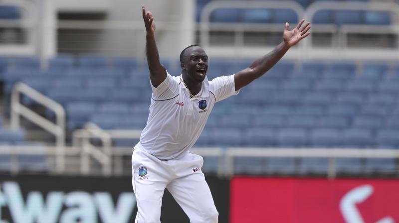 In the second innings, Kemar Roach scalped three Indian wickets while he was able to get hold of one wicket in the first innings. (Photo:AP) In the second innings, Kemar Roach scalped three Indian wickets while he was able to get hold of one wicket in the first innings. (Photo:AP)