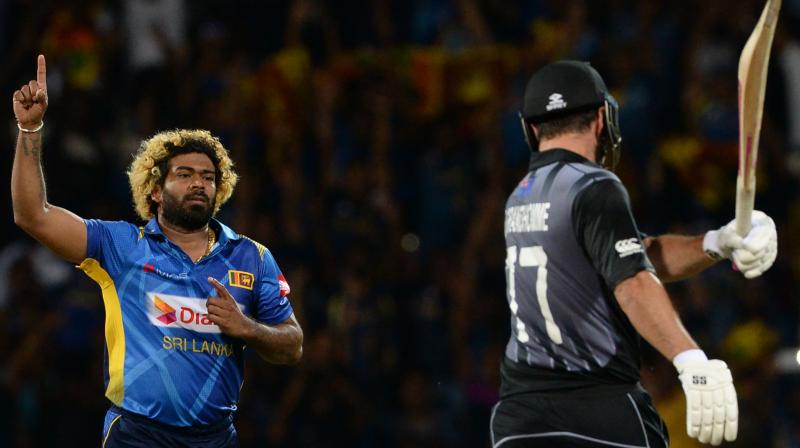 36-year-old Lasith Malinga scalped the wicket of Colin de Grandhomme in the 14th over of the Kiwi innings to achieve the feat. (Photo:AFP) 36-year-old Lasith Malinga scalped the wicket of Colin de Grandhomme in the 14th over of the Kiwi innings to achieve the feat. (Photo:AFP)
