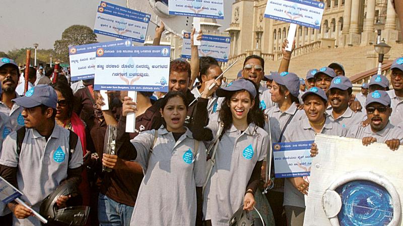 Volunteers participate in a campaign ‘Save Water Save Bengaluru’ on World Water Day, at Vidhana Soudha, in Bengaluru on Wednesday (Photo: DC) Volunteers participate in a campaign ‘Save Water Save Bengaluru’ on World Water Day, at Vidhana Soudha, in Bengaluru on Wednesday (Photo: DC)