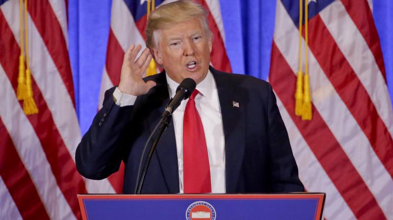 President-elect Donald Trump speaks during a news conference in the lobby of Trump Tower in New York. (Photo: AP) President-elect Donald Trump speaks during a news conference in the lobby of Trump Tower in New York. (Photo: AP)