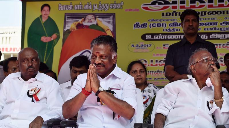 Dissident AIADMK leader and former chief minister O Panneerselvam with supporters during their day-long fast demanding CBI probe into alleged suspicious circumstances surrounding the death of late Chief Minister J Jayalalilthaa. (Photo: PTI) Dissident AIADMK leader and former chief minister O Panneerselvam with supporters during their day-long fast demanding CBI probe into alleged suspicious circumstances surrounding the death of late Chief Minister J Jayalalilthaa. (Photo: PTI)