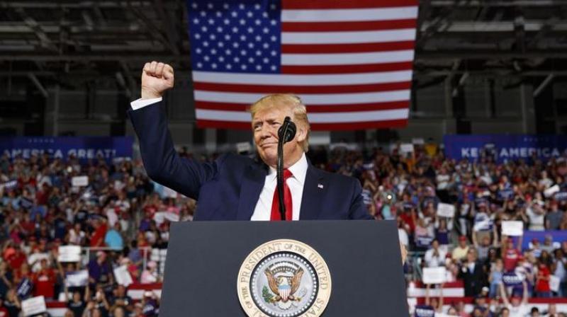 Eager to rile up his base with the some of the same kind of rhetoric he targeted at minorities and women in 2016, Trump declared, 'I think in some cases they hate our country.' (Photo: AP) Eager to rile up his base with the some of the same kind of rhetoric he targeted at minorities and women in 2016, Trump declared, 'I think in some cases they hate our country.' (Photo: AP)