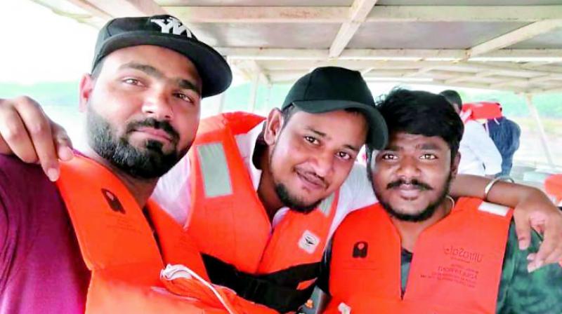 Whil Md Mujuriddin (extreme left) has managed to survive the mishap, Taleb patel and E. Sai kumar are still missing. Whil Md Mujuriddin (extreme left) has managed to survive the mishap, Taleb patel and E. Sai kumar are still missing.