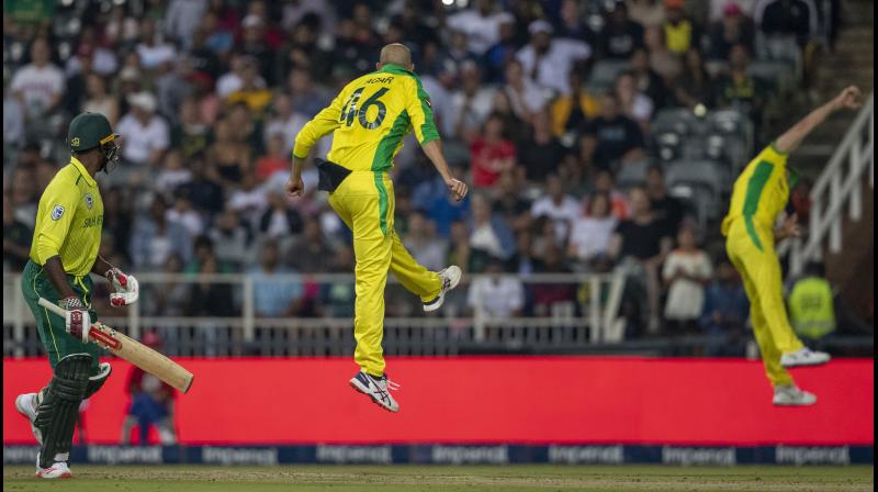 Australia off-spinner Ashton Agar took a career-best 5-24, including a hat-trick, as they thrashed hosts South Africa by a massive 107 runs in the first Twenty20 International at The Wanderers on Friday. (Photo:AP)