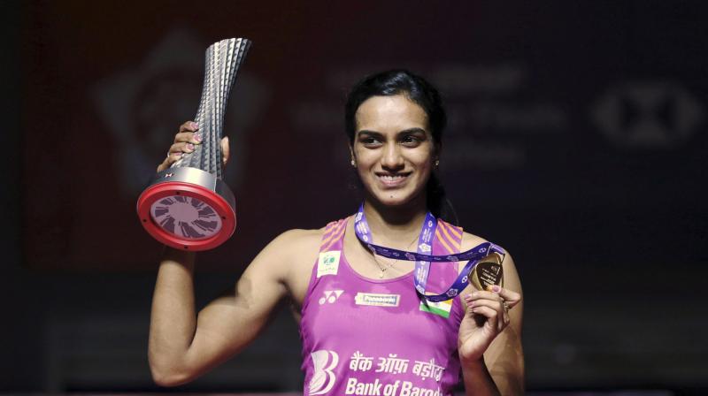Sindhu, after winning the World Tour Finals championship, became the first Indian ever to get hold of the prestigious championship. (Photo: AP) Sindhu, after winning the World Tour Finals championship, became the first Indian ever to get hold of the prestigious championship. (Photo: AP)
