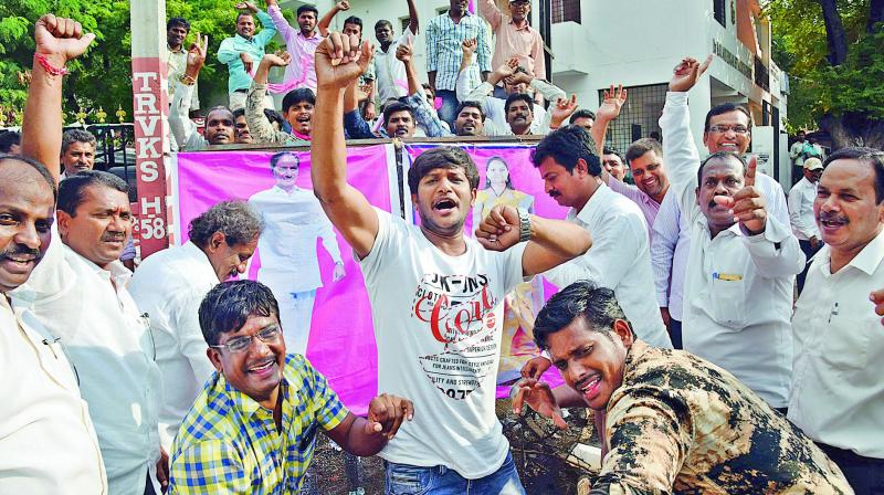 Electricity employees celebrate the High Court verdict in their favour for regularisation of their jobs, in Hyderabad, on Tuesday. (Photo: Gandhi) Electricity employees celebrate the High Court verdict in their favour for regularisation of their jobs, in Hyderabad, on Tuesday. (Photo: Gandhi)