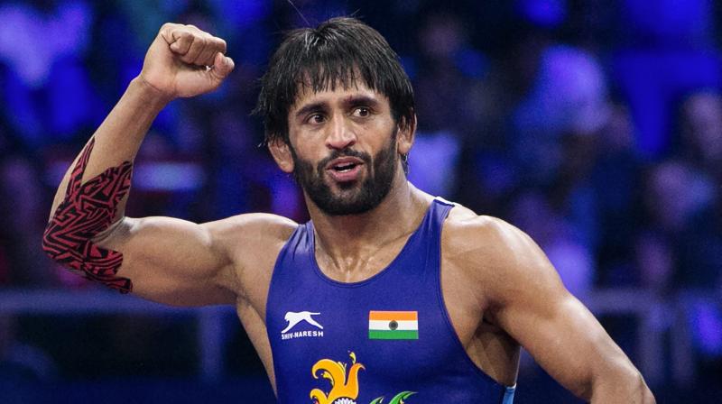 Bajrang Punia, who has won five medals this season, including CWG and Asian Games gold and a silver at the World Championship, was placed atop the ranking table with 96 points in the UWW list. (Photo: PTI) Bajrang Punia, who has won five medals this season, including CWG and Asian Games gold and a silver at the World Championship, was placed atop the ranking table with 96 points in the UWW list. (Photo: PTI)