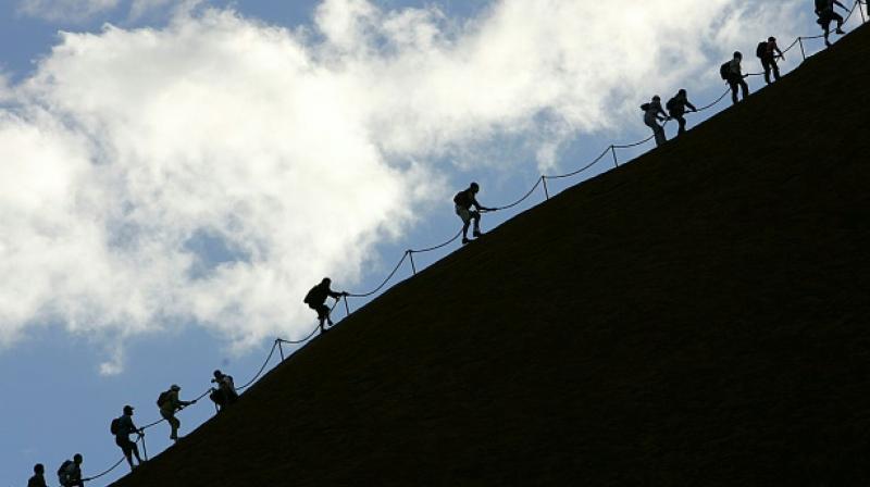 The traditional owners of the land feel that tourists are being 'ignorant'. (Photo: AFP) The traditional owners of the land feel that tourists are being 'ignorant'. (Photo: AFP)