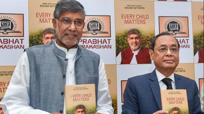 Justice Ranjan Gogoi releases the book 'Every Child Matters' written by Nobel Peace Laureate Kailash Satyarthi at a function, in New Delhi. (Photo: PTI) Justice Ranjan Gogoi releases the book 'Every Child Matters' written by Nobel Peace Laureate Kailash Satyarthi at a function, in New Delhi. (Photo: PTI)