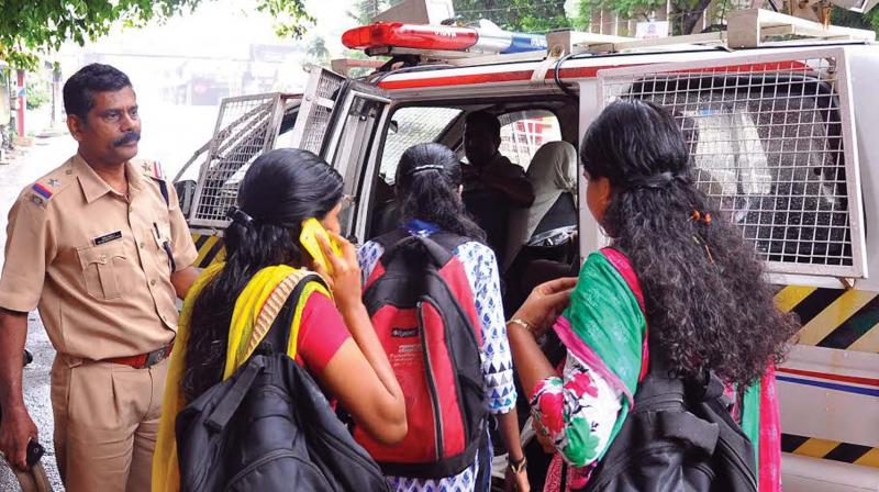 Police offers ride for students waiting to go home after their LET entrance exam held at the Government Model Higher Secondary School in Kozhikode on Saturday (Photo: Viswajith K) Police offers ride for students waiting to go home after their LET entrance exam held at the Government Model Higher Secondary School in Kozhikode on Saturday (Photo: Viswajith K)
