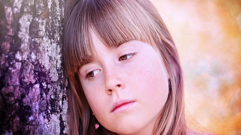 Children were classified as bullies if their parents responded \definitely\ or \somewhat true\ when asked if their child \bullies others, picks on them, or excludes them\.