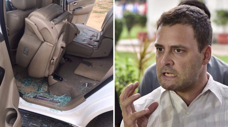 A man threw stones at Rahul Gandhi's car, breaking its rear glass when he on his way from Lal Chowk to the helipad in Dhanera, Gujarat. (Photos: ANI Twitter/PTI) A man threw stones at Rahul Gandhi's car, breaking its rear glass when he on his way from Lal Chowk to the helipad in Dhanera, Gujarat. (Photos: ANI Twitter/PTI)