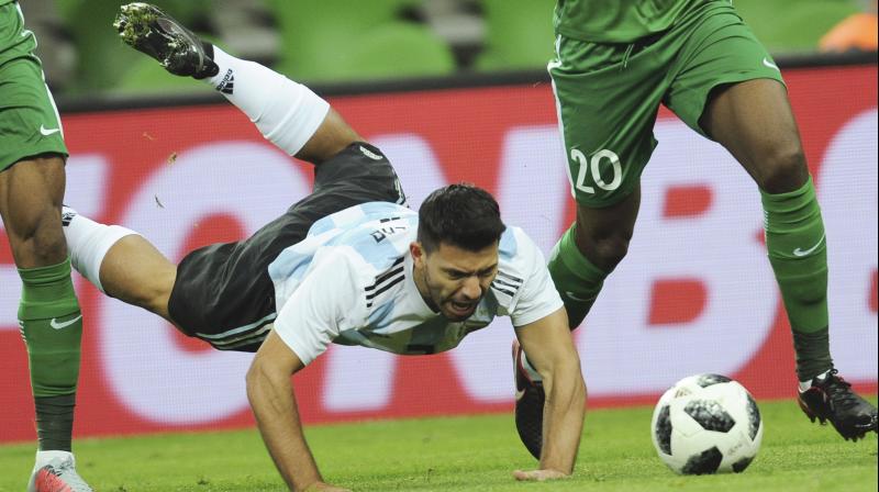 Sergio Aguero scored for Argentina before he was taken to hospital at hal-time (Photo:AP) Sergio Aguero scored for Argentina before he was taken to hospital at hal-time (Photo:AP)