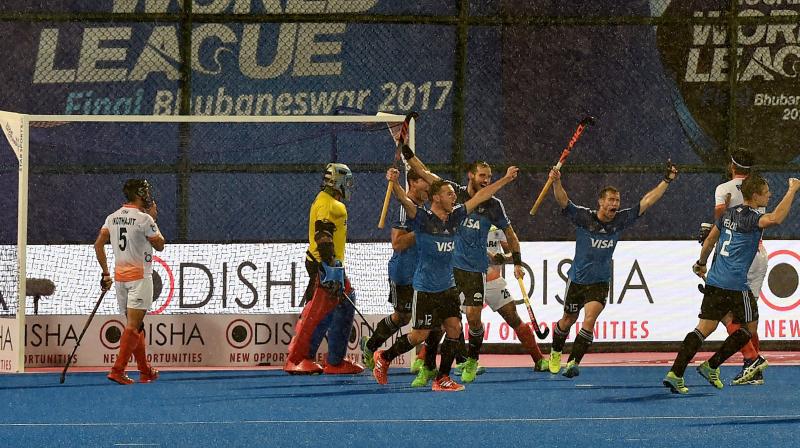 Argentina players celebrate after scoring the opening goal against India in the Hockey World League semi final. (Photo: PTI)) Argentina players celebrate after scoring the opening goal against India in the Hockey World League semi final. (Photo: PTI))