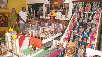 Retired bank employee Rajalakshmi and her husband retired professor K.R. Ramana pose with their Kolu ocassion of Dasara festivities in Hyderabad on Friday. (Image: DC)