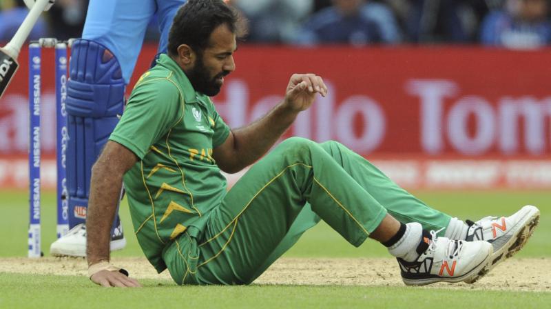 The 31-year-old Wahab Riaz sustained the injury whilst bowling during his side's crushing 124-run defeat against arch-rivals India at the Edgbaston Cricket Ground in Birmingham on Sunday.(Photo:AP) The 31-year-old Wahab Riaz sustained the injury whilst bowling during his side's crushing 124-run defeat against arch-rivals India at the Edgbaston Cricket Ground in Birmingham on Sunday.(Photo:AP)
