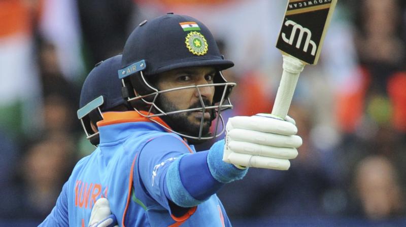 While Yuvraj Singh was hitting freely, Virat Kohli slowly gained in momentum and hammered his 40th fifty off 58 balls and his first against Pakistan. (Photo: AP) While Yuvraj Singh was hitting freely, Virat Kohli slowly gained in momentum and hammered his 40th fifty off 58 balls and his first against Pakistan. (Photo: AP)