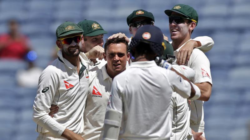 Steve O'Keefe celebrates with his teammates after dismissing Ajinkya Rahane. (Photo: AP) Steve O'Keefe celebrates with his teammates after dismissing Ajinkya Rahane. (Photo: AP)