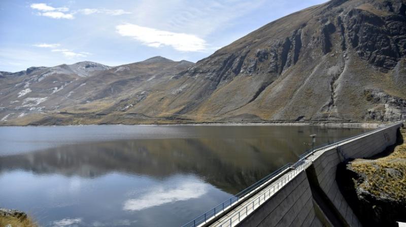 The Inkachaka dam looks full, but the snowcaps in the mountains around have disappeared. (Photo: AFP) The Inkachaka dam looks full, but the snowcaps in the mountains around have disappeared. (Photo: AFP)