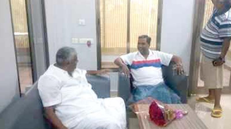 A file picture of former chief minister Siddaramaiah with Public Works Minister H.D. Revanna at Shanthivana near Dharmasthala. A file picture of former chief minister Siddaramaiah with Public Works Minister H.D. Revanna at Shanthivana near Dharmasthala.