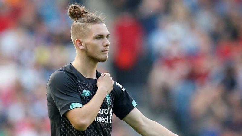 After registering a 2-0 win against MK Dons in the Carabao Cup, Liverpool coach Juergen Klopp labelled striker Harvey Elliot as a 'brilliant boy'. (Photo:AFP) After registering a 2-0 win against MK Dons in the Carabao Cup, Liverpool coach Juergen Klopp labelled striker Harvey Elliot as a 'brilliant boy'. (Photo:AFP)