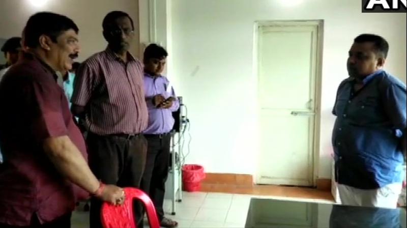 On specific information, Barman along with a team of senior health department officials rushed to the hospital and directly entered into the labour room where the operation was going on. (Photo: ANI | Twitter) On specific information, Barman along with a team of senior health department officials rushed to the hospital and directly entered into the labour room where the operation was going on. (Photo: ANI | Twitter)