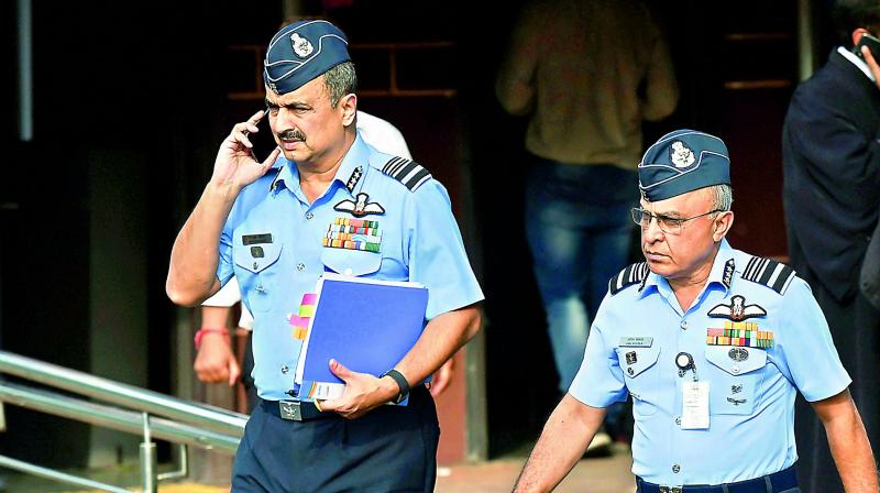 Deputy chief of air staff Air Marshal V.R. Chaudhari with Air Marshal Anil Khosla (R) leave the Supreme Court after a hearing on Rafale Deal on Wednesday. (PTI) Deputy chief of air staff Air Marshal V.R. Chaudhari with Air Marshal Anil Khosla (R) leave the Supreme Court after a hearing on Rafale Deal on Wednesday. (PTI)