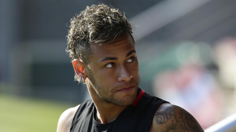 Neymar’s decision to visit Shanghai comes a day after a major event organiser in China said a meet-and-greet with the forward on Monday in Shanghai was off because he and his advisers were busy with transfer business. (Photo: AP) Neymar’s decision to visit Shanghai comes a day after a major event organiser in China said a meet-and-greet with the forward on Monday in Shanghai was off because he and his advisers were busy with transfer business. (Photo: AP)