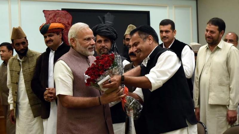 Delegation of All Jammu and Kashmir Panchayat Conference greet Prime Minister Narendra Modi in New Delhi. (Photo: Twitter) Delegation of All Jammu and Kashmir Panchayat Conference greet Prime Minister Narendra Modi in New Delhi. (Photo: Twitter)