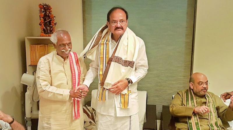 M Venkaiah Naidu with Union Labour Minister Bandaru Dattatreya. (File photo) M Venkaiah Naidu with Union Labour Minister Bandaru Dattatreya. (File photo)