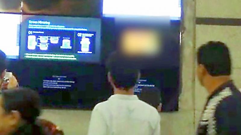 A tv grab of the pornographic clip being played on an LED screen at Rajiv Chowk Metro Station in Delhi. A tv grab of the pornographic clip being played on an LED screen at Rajiv Chowk Metro Station in Delhi.