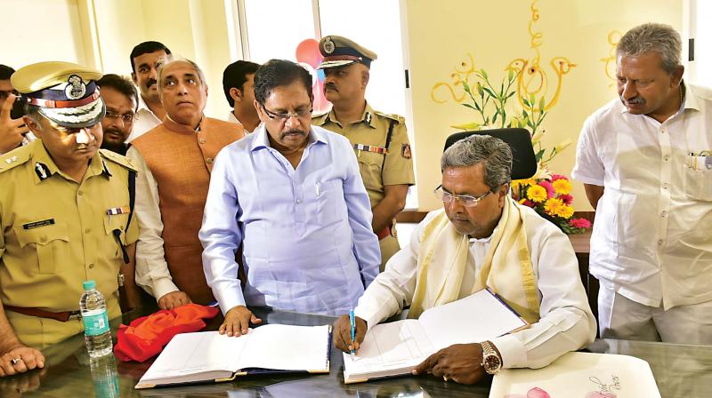 Chief Minister Siddaramaiah with Home Minister Dr. G Parameshwar,Union Minister D.V.Sadananda Gowda and MLA Arvind Limbavali at the newly-constructed police station at Whitefield, in Bengaluru on Thursday. Chief Minister Siddaramaiah with Home Minister Dr. G Parameshwar,Union Minister D.V.Sadananda Gowda and MLA Arvind Limbavali at the newly-constructed police station at Whitefield, in Bengaluru on Thursday.