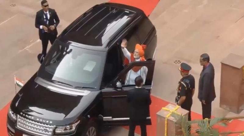 In the video, Prime Minister Narendra Modi can be seen waving is hand before sitting on the navigator seat of his SUV and wearing his seat belt. (Photo: Twitter | @PIB_India) In the video, Prime Minister Narendra Modi can be seen waving is hand before sitting on the navigator seat of his SUV and wearing his seat belt. (Photo: Twitter | @PIB_India)