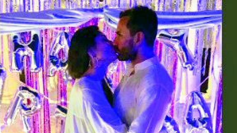 The actress kissed Saif Ali Khan in an overly dramatic manner, and the picture has now gone viral on social media The actress kissed Saif Ali Khan in an overly dramatic manner, and the picture has now gone viral on social media