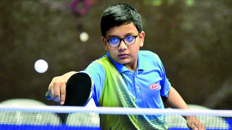 Dhuv Sagar plays a shot on way to winning the Cadet Boys final at the Dr M. V. Sridhar Memorial State Ranking Table Tennis Tournament in Hyderabad. Dhuv Sagar plays a shot on way to winning the Cadet Boys final at the Dr M. V. Sridhar Memorial State Ranking Table Tennis Tournament in Hyderabad.