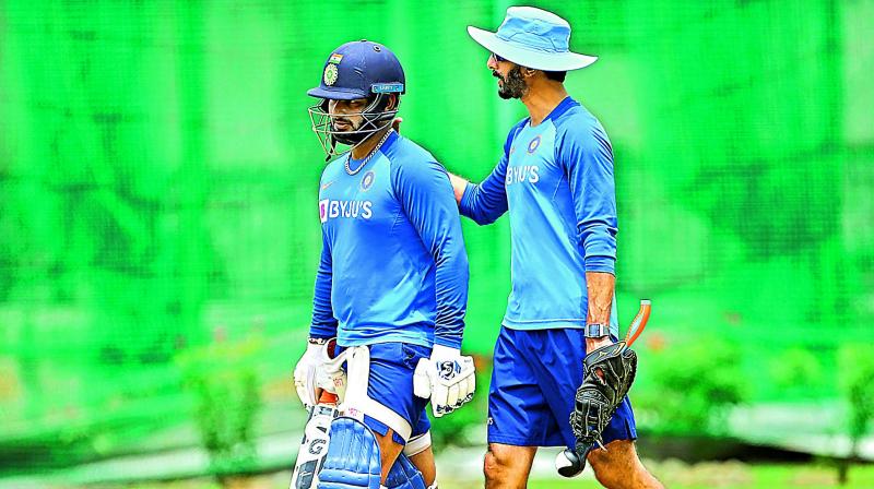 Rishabh Pant (left) and batting coach Vikram Rathour. Rishabh Pant (left) and batting coach Vikram Rathour.