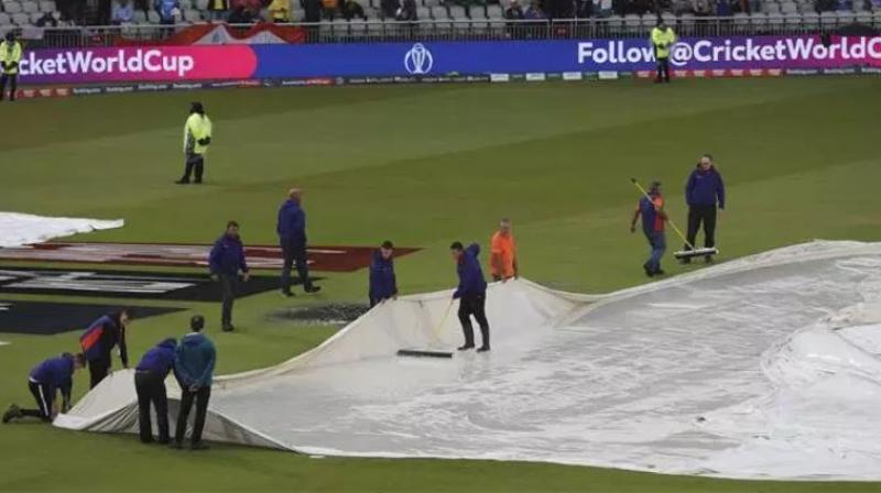 As India look to resume their semi-final match against the Kiwis, rains look to interrupt the match once again on the reserve day. (Photo:AP) As India look to resume their semi-final match against the Kiwis, rains look to interrupt the match once again on the reserve day. (Photo:AP)