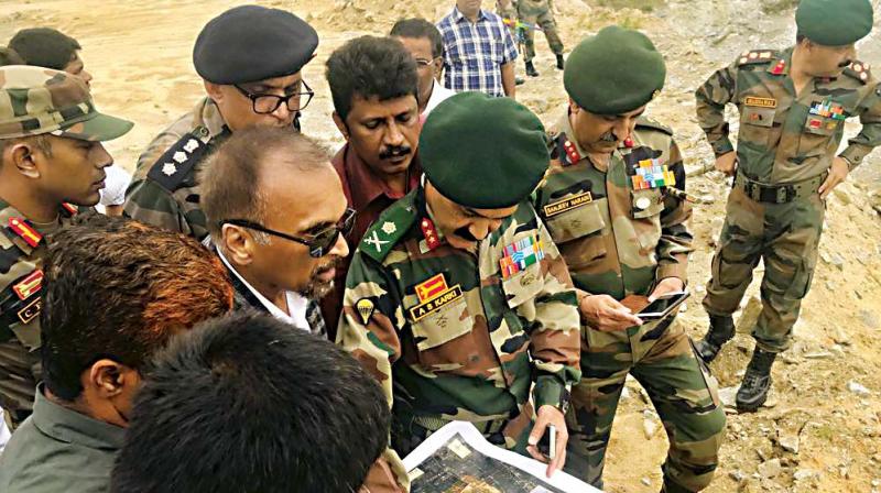 Army officers surveying the area near Bannerghatta National Park.(Image Dc) Army officers surveying the area near Bannerghatta National Park.(Image Dc)