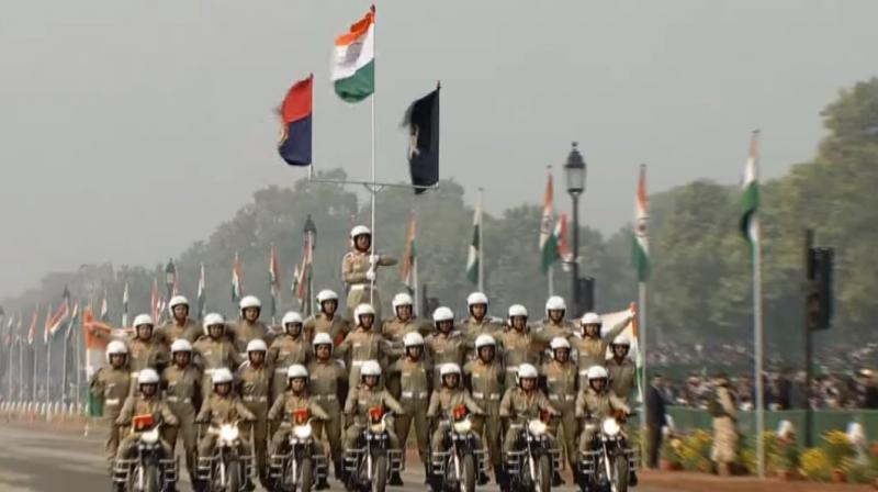 The highlight of the parade was the motorcycle contingent, 'Seema Bhawani', comprising women personnel of the BSF that showcased their skills for the first time at the parade. (Photo: Twitter | @airnewsalerts) The highlight of the parade was the motorcycle contingent, 'Seema Bhawani', comprising women personnel of the BSF that showcased their skills for the first time at the parade. (Photo: Twitter | @airnewsalerts)