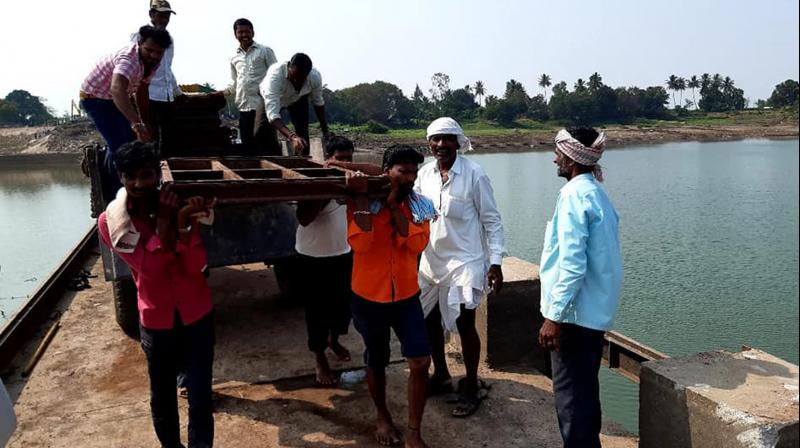 People of 30 villages unite to fill the barrage they built People of 30 villages unite to fill the barrage they built