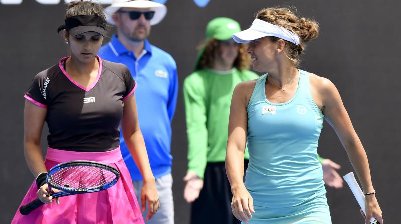 Sania was in for disappointment as the Indian, partnering Barbora Strycova of Czech Republic, lost to Japanese E Hozumi and M Kato 3-6 6-2 2-6. (Photo: AP) Sania was in for disappointment as the Indian, partnering Barbora Strycova of Czech Republic, lost to Japanese E Hozumi and M Kato 3-6 6-2 2-6. (Photo: AP)