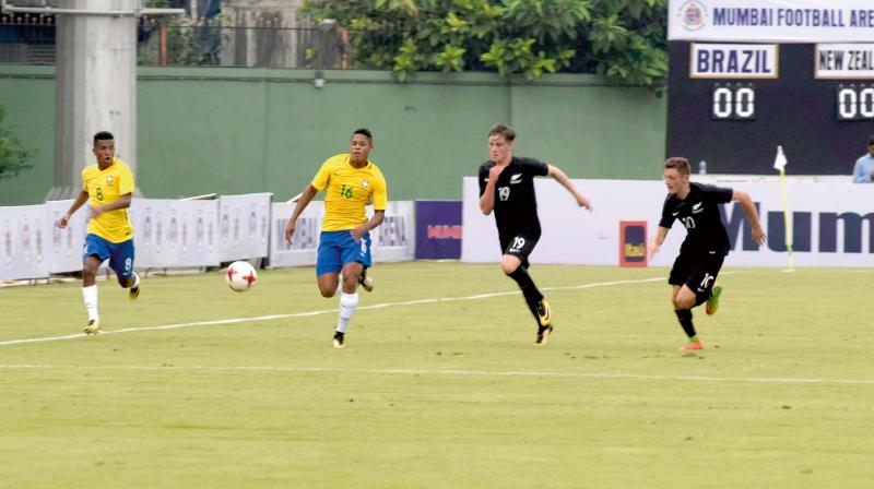 Brazil and New Zealand players at a practice match in Mumbai on Thursday, ahead of the Fifa U-17 World Cup that gets under way on October 6. — Shripad Naik Brazil and New Zealand players at a practice match in Mumbai on Thursday, ahead of the Fifa U-17 World Cup that gets under way on October 6. — Shripad Naik