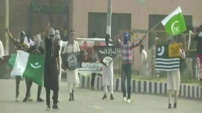 Demonstrators also pelted stones on security personnel, who were trying to disperse them. (Photo: ANI) Demonstrators also pelted stones on security personnel, who were trying to disperse them. (Photo: ANI)