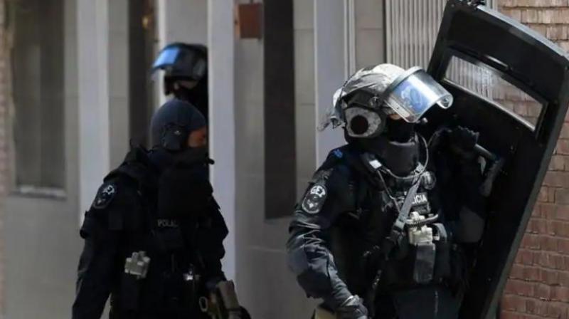 Special police forces leave after searching the apartment of a man who tried to attack a police station in Cornella near the northeastern Spanish city of Barcelona on August 20, 2018. (Photo: AFP) Special police forces leave after searching the apartment of a man who tried to attack a police station in Cornella near the northeastern Spanish city of Barcelona on August 20, 2018. (Photo: AFP)