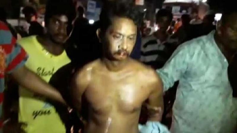 38-year-old English teacher, Rambabu, was made to walk on a busy road, in full traffic. (Photo: Twitter Screengrab/ @srinu094) 38-year-old English teacher, Rambabu, was made to walk on a busy road, in full traffic. (Photo: Twitter Screengrab/ @srinu094)