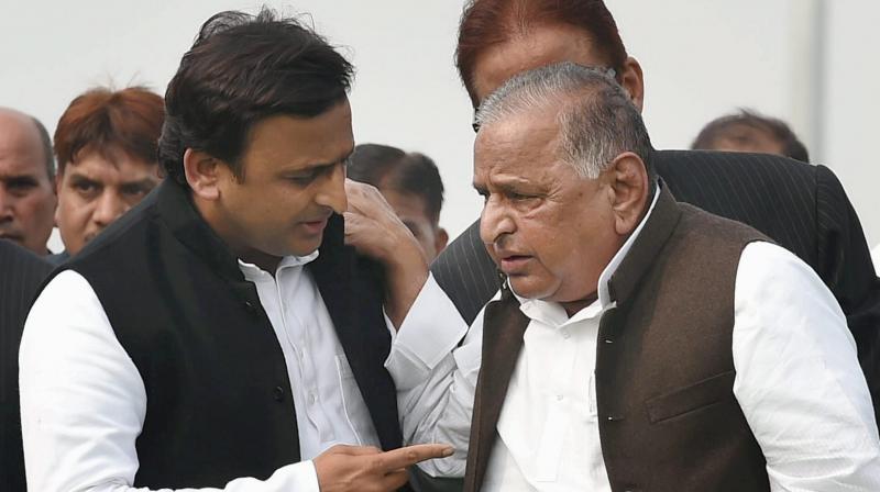 SP supremo Mulayam Singh Yadav and UP CM Akhilesh Yadav during a function in Lucknow. (Photo: PTI) SP supremo Mulayam Singh Yadav and UP CM Akhilesh Yadav during a function in Lucknow. (Photo: PTI)