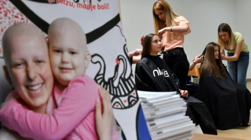 As trivial as it might seem at first while a person is battling such an aggressive disease, hair loss is often a huge psychological burden. (Photo: AFP) As trivial as it might seem at first while a person is battling such an aggressive disease, hair loss is often a huge psychological burden. (Photo: AFP)