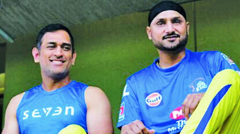 Mahendra Singh Dhoni and Harbhajan Singh Mahendra Singh Dhoni and Harbhajan Singh